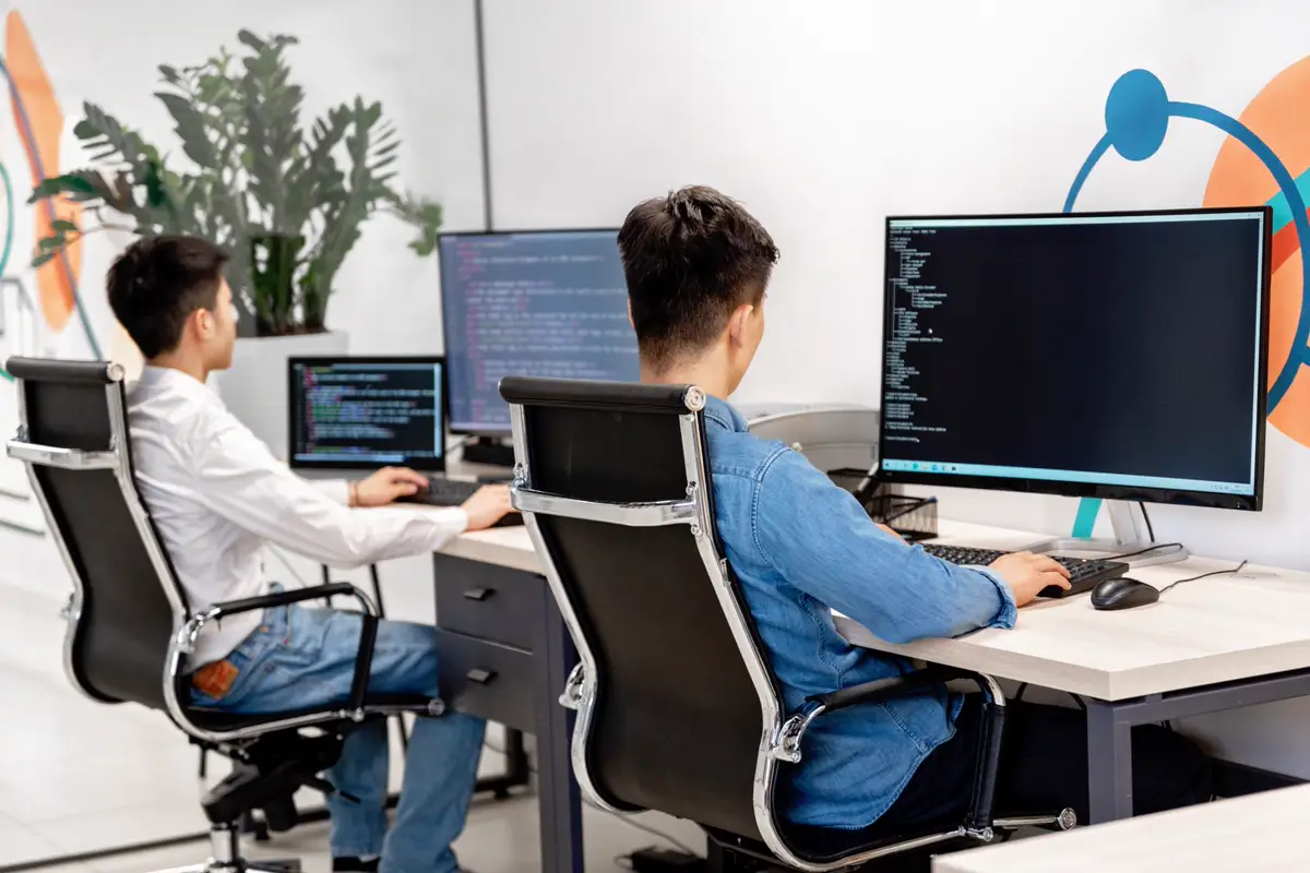 ProTech Support technicians working at their workstations